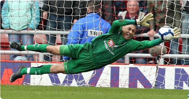 Gomes saves the first of two Darren Bent penalties at Sunderland