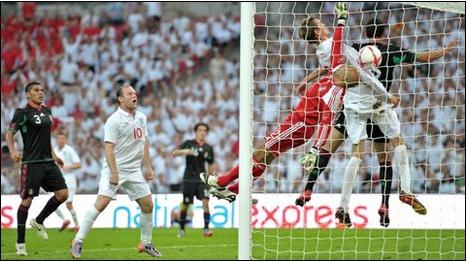 Peter Crouch scores England's second goal against Mexico, May 2010