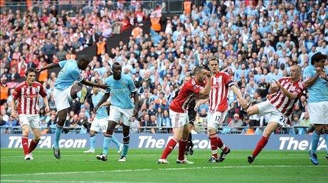 Yaya Toure scores the winning goal for Manchester City against Stoke City in the 2011 FA Cup Final