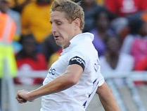 Michael Dawson in action against Kaizer Chiefs, July 2011