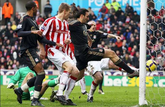 Sotirios Kyrgiakos scores for Liverpool against Stoke City