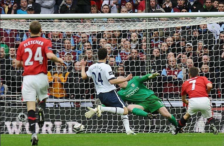 Michael Owen scores in the 2010 League Cup Final