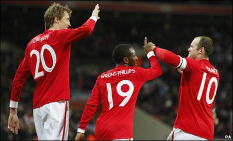 Peter Crouch celebrates his two goals against Egypt