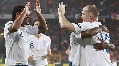 Wayne Rooney celebrates his goal against Switzerland