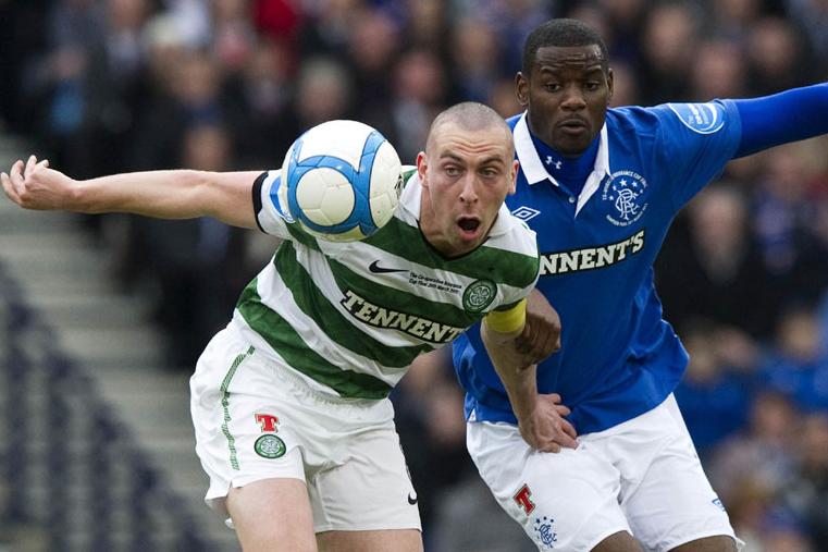 Celtic's Scott Brown with Rangers' Maurice Edu, Scottish League Cup Final, March 2011