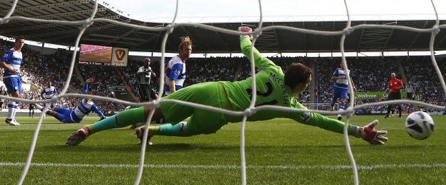 Jermain Defoe scores his first goal against Reading, September 2012