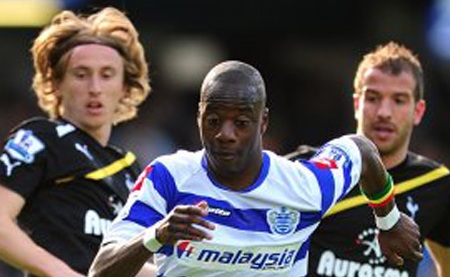 Samba Diakite of QPR against Luka Modric & Rafael van der Vaart of Tottenham