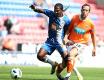 Action from Blackpools first Premier League match away at Wigan Athletic